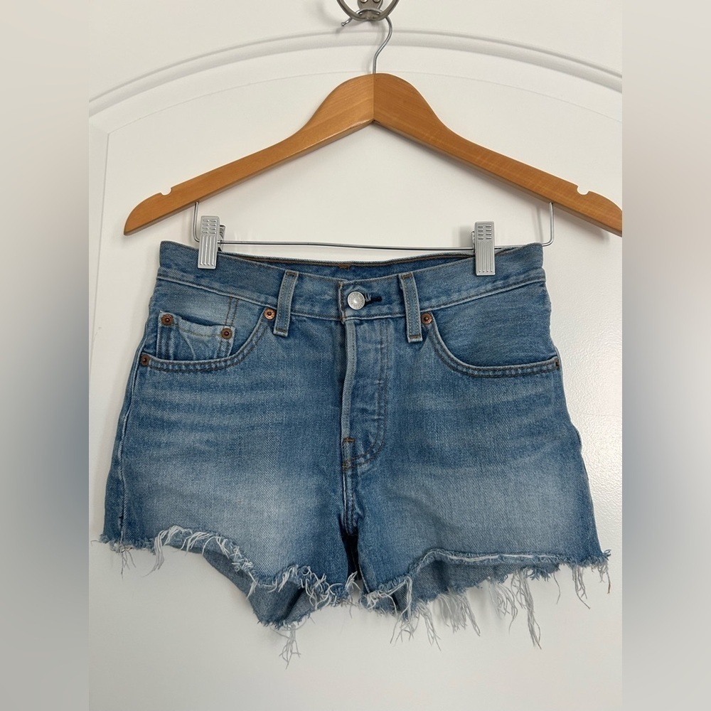 Levi’s 501 Lightwash Distressed Shorts size 27 100% cotton